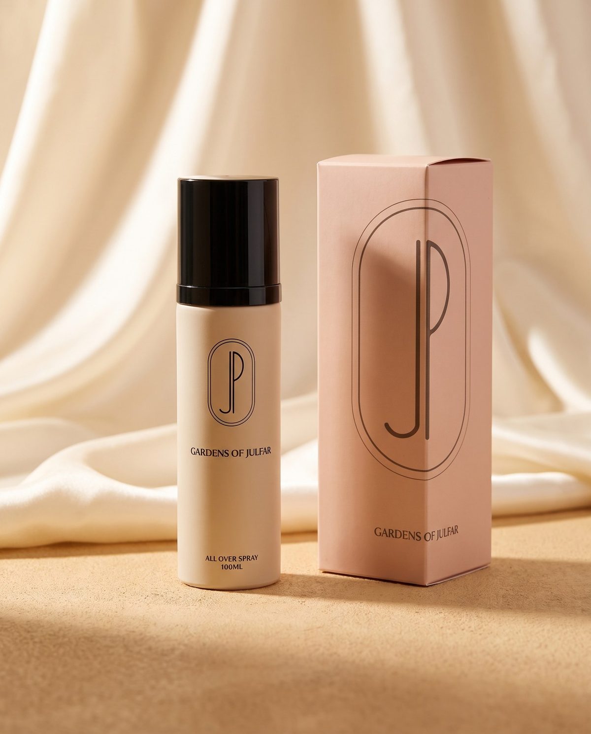 Gardens of Julfar — cream bottle with black cap beside its blush keepsake box
