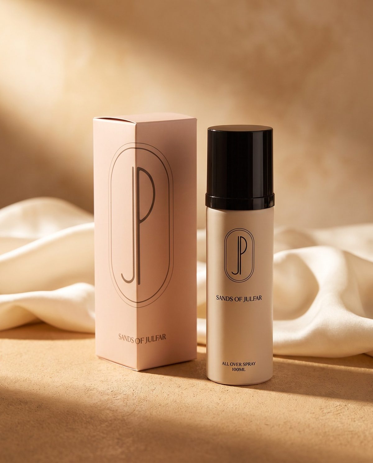 Sands of Julfar — cream bottle with black cap beside its blush keepsake box